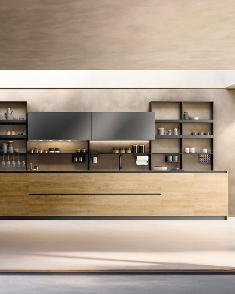 Modern minimalist kitchen with wide natural wood cabinetry, matte black upper units, open shelves, and a dark marble countertop in a neutral-toned room.